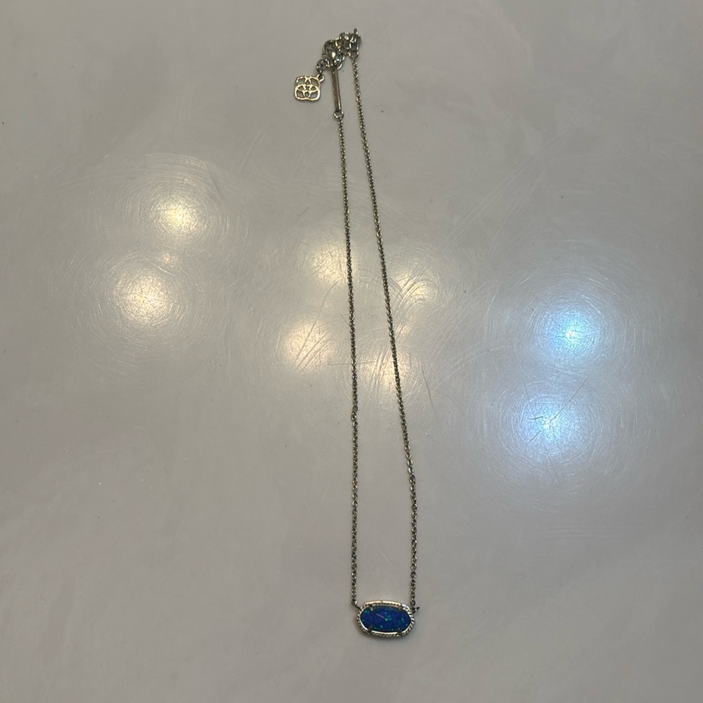 Gold Elisa with Royal Blue Kyocera stone